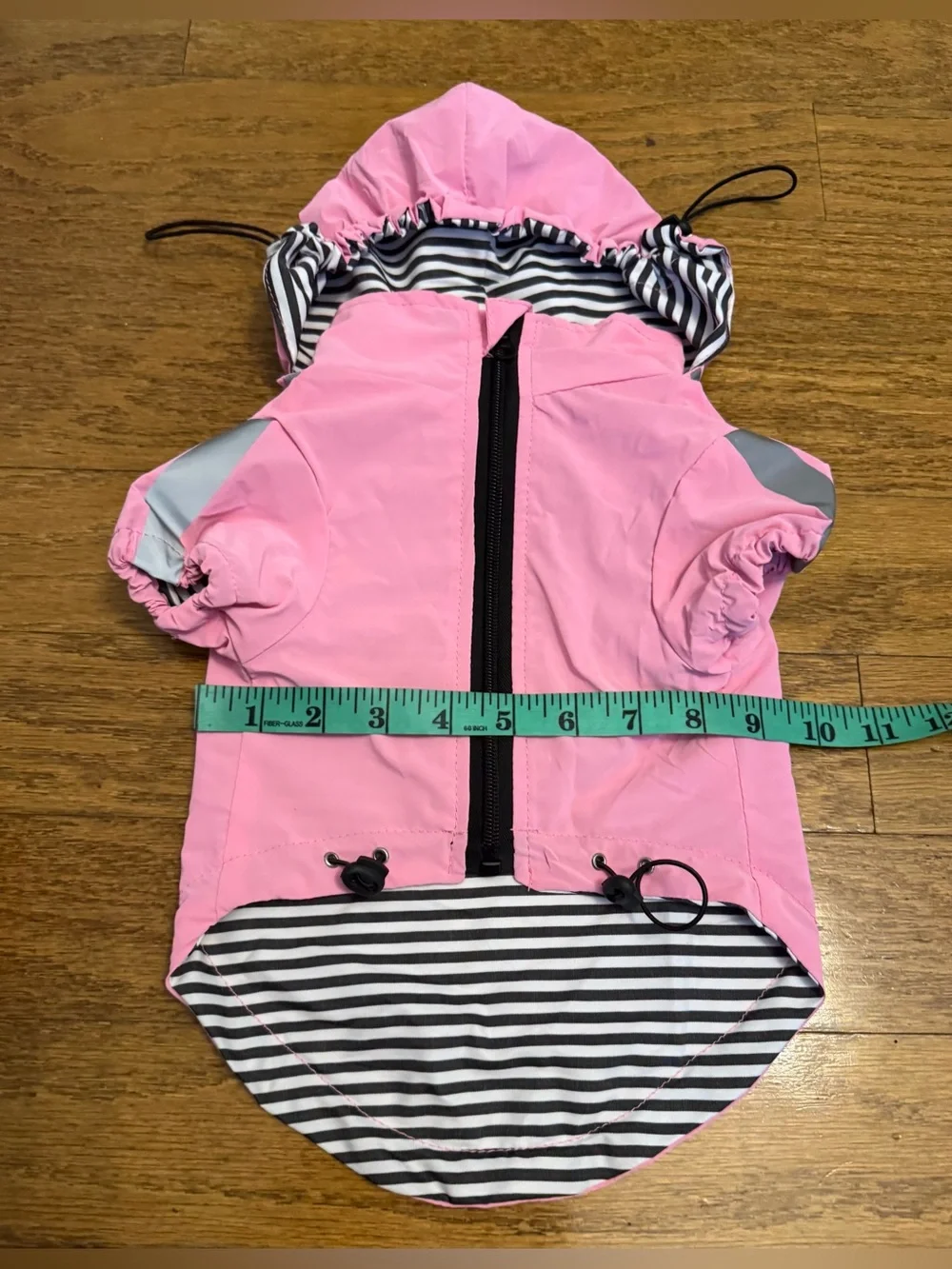 OKpangcho dog raincoat (pink, size M). Features a detachable hood, making it a v